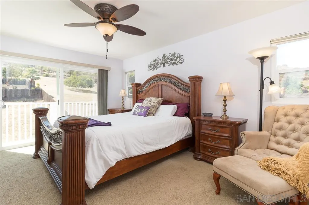 11027 Eddington Road Santee, CA 92071 - Photo 14 of 25 a bedroom with bed and window