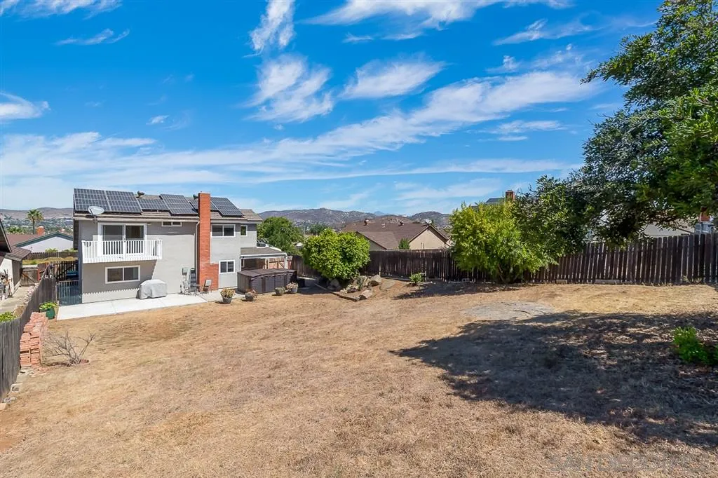 11027 Eddington Road Santee, CA 92071 - Photo 24 of 25 a street view with residential house