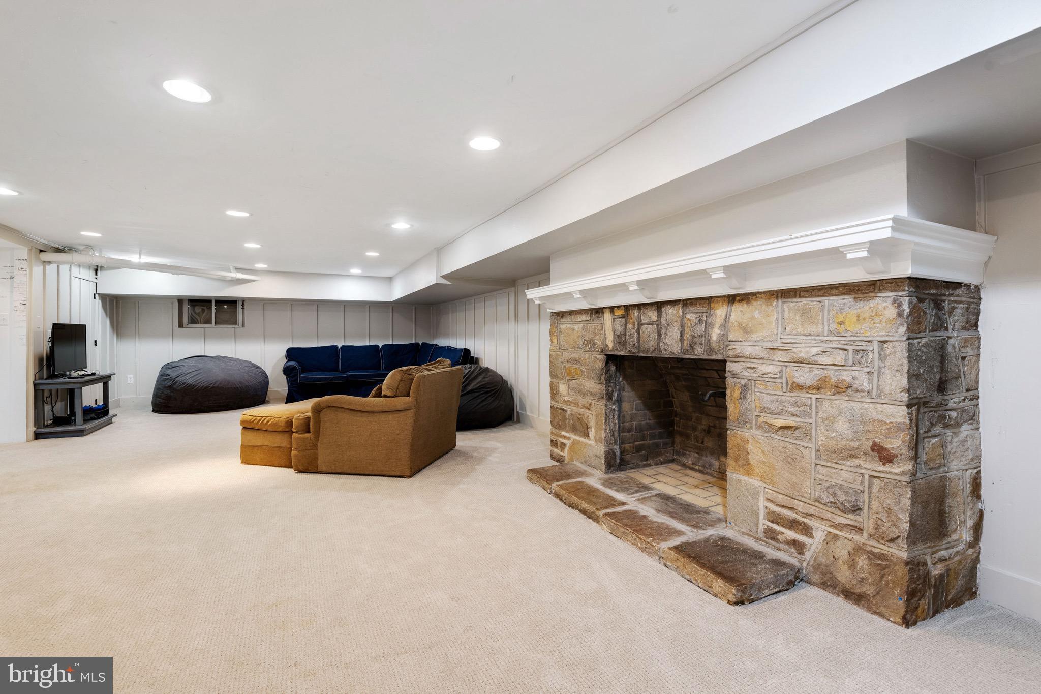 500 Somerset Road Baltimore, MD 21210 - Photo 59 of 80 Finished lower level with stone fireplace