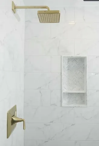 a bathroom with a sink a toilet and bathtub