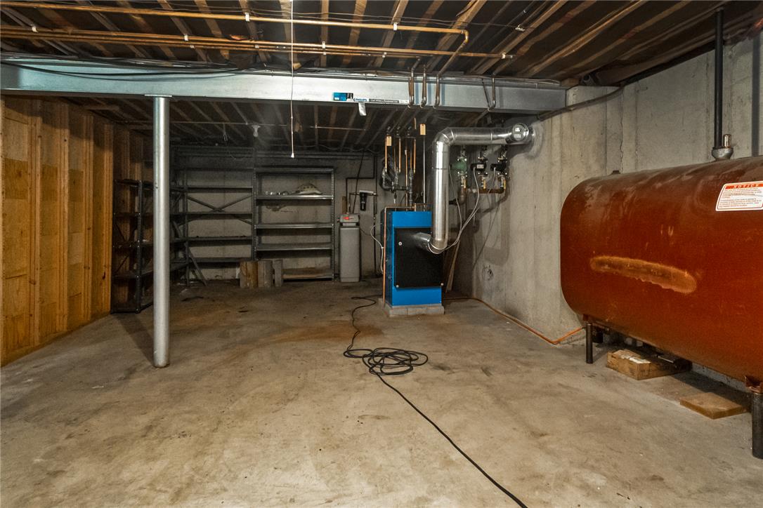 1657 Clearview Road Coplay, PA 18037 - Photo 71 of 77 Functional unfinished basement offering ample storage solutions and essential utility infrastructure.