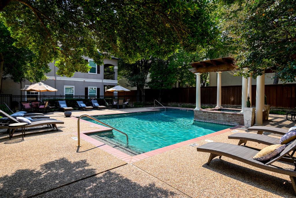 a view of a backyard with a patio