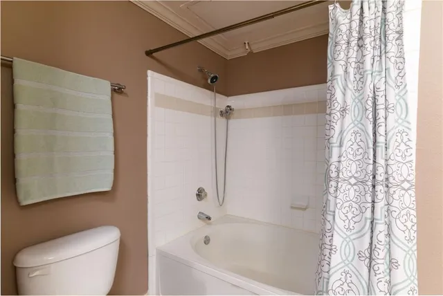 a bathroom with double sink and a mirror