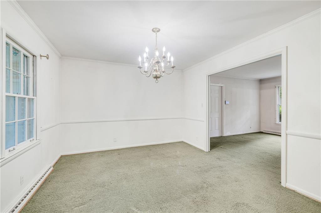 1911 Alderbrook Road Northeast Atlanta, GA 30345 - Photo 11 of 33 an empty room with a empty space