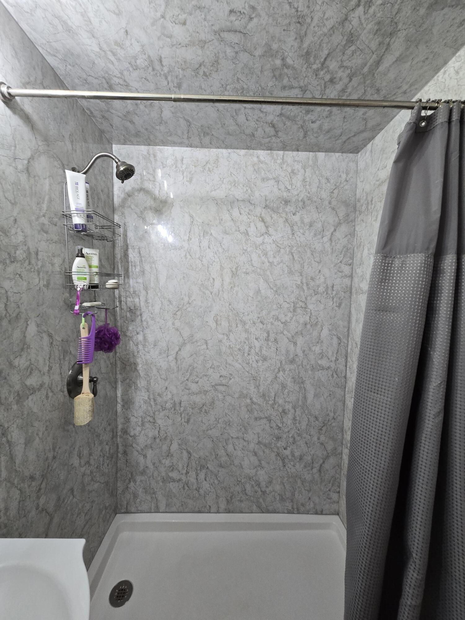 305 North 21st Street Lamesa, TX 79331 - Photo 18 of 23 a bathroom with a shower