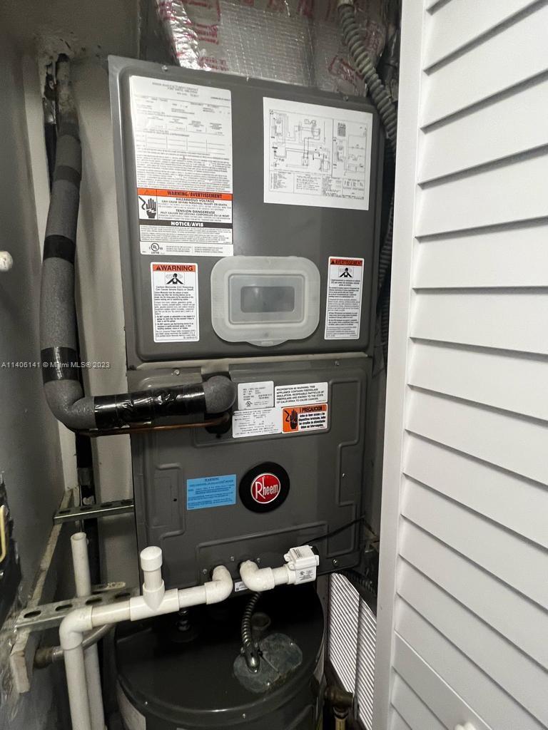 6800 Cypress Road, Unit 211 Plantation, FL 33317 - Photo 15 of 19 a bathroom with a sink and a mirror