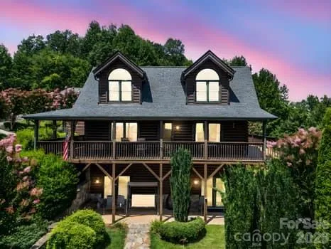 a front view of a house with a porch