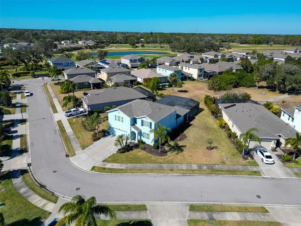 an aerial view of a house with a garden