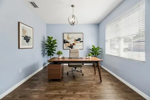 a kitchen with stainless steel appliances granite countertop a sink and stove