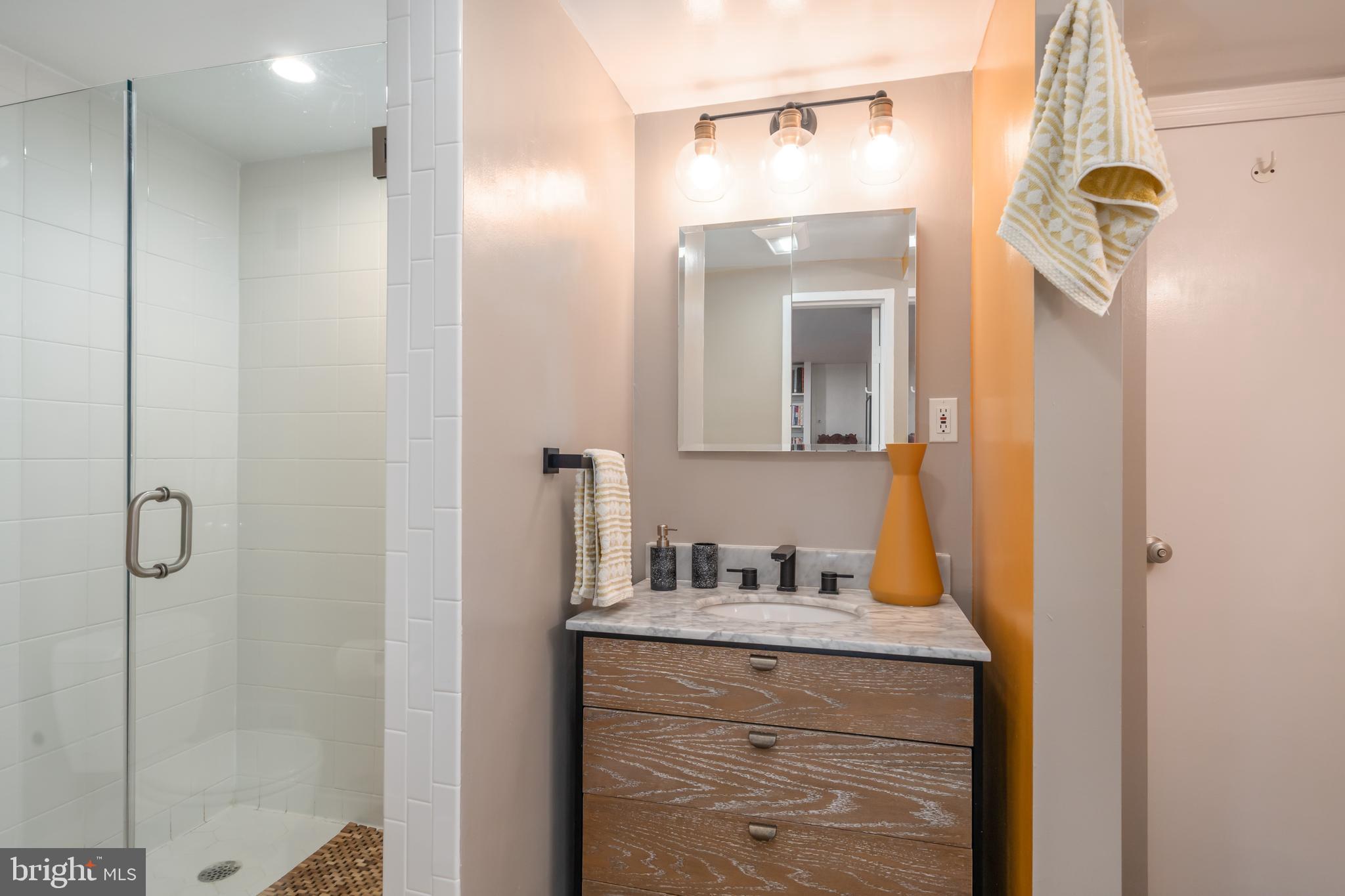 2201 Paul Spring Road Alexandria, VA 22307 - Photo 23 of 24 First Floor Full Bath with new floor and vanity.