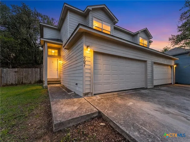 a view of backyard of house