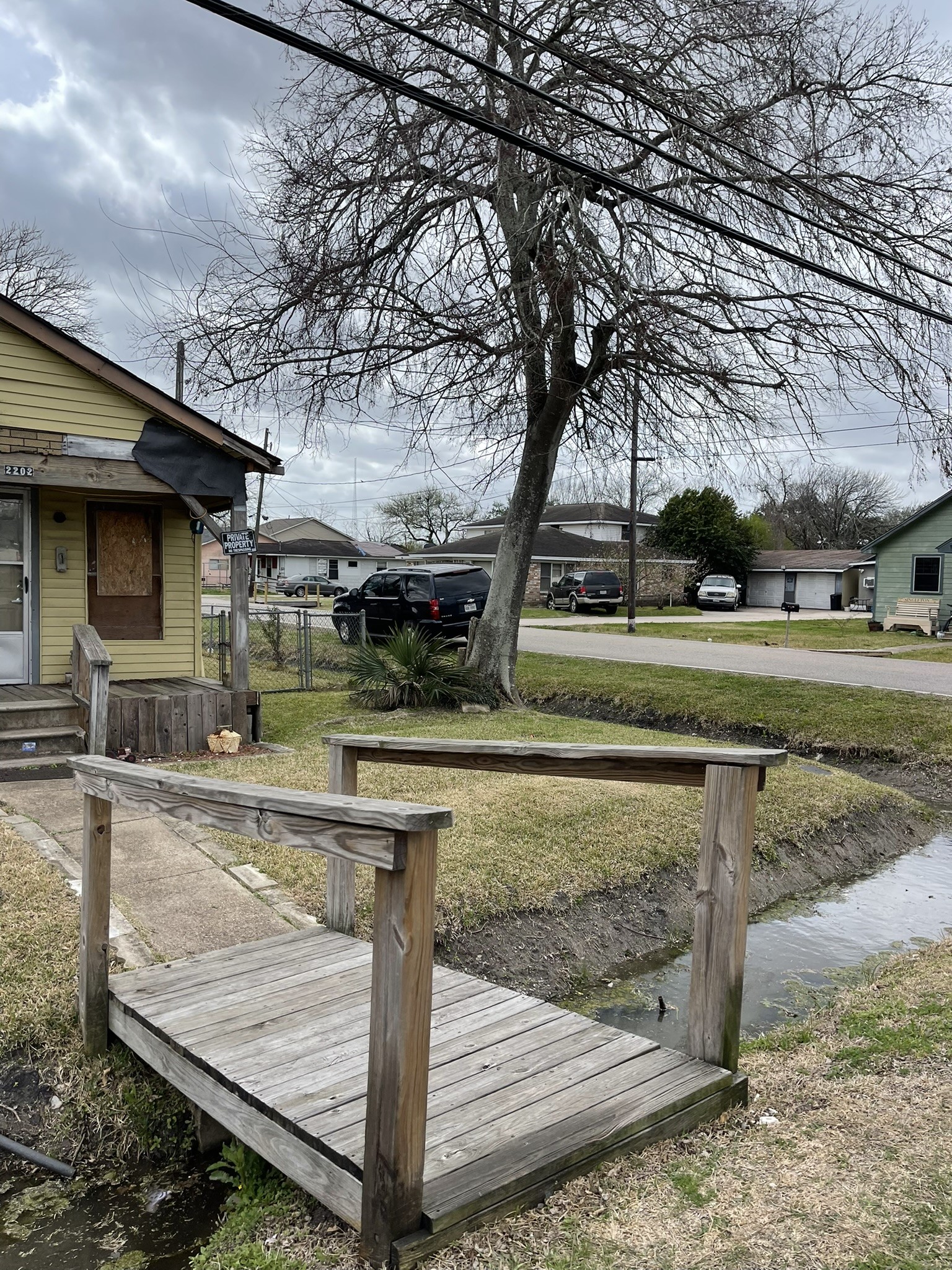 2202 Jones Road Baytown, TX 77521 - Photo 2 of 9 a view of a house with a yard