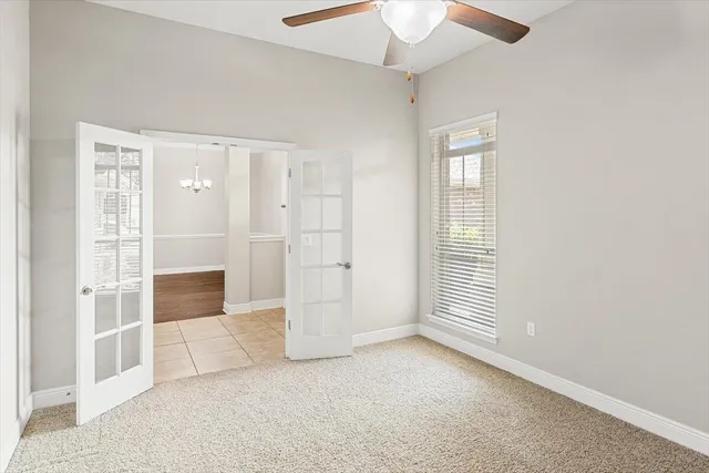 a white bath tub sitting next to a window