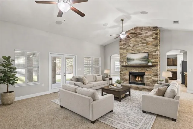 a kitchen with a stove a sink and a microwave