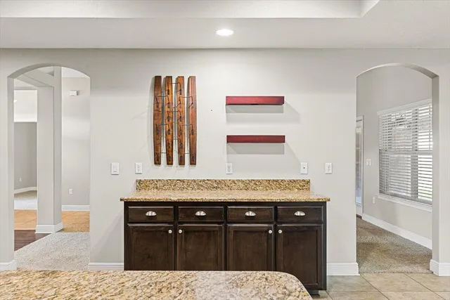 a view of a workspace with furniture