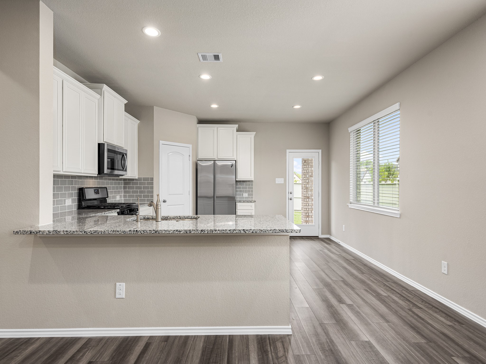 9278 Inland Leather Lane Conroe, TX 77385 - Photo 8 of 35 Space for barstools