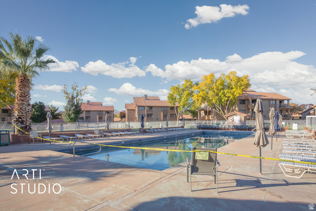 860 South Village Road, Unit A6 St. George, UT 84770 - Photo 22 of 41 View of pool with patio surround and a residential view