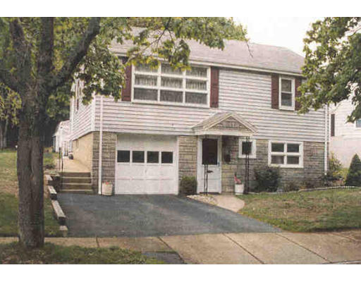 63 Moffatt Road Salem, MA 01970 - Photo 1 of 1 a view of a house with a yard