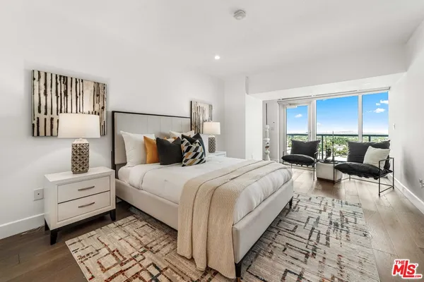 a bed room with a bed and a couch