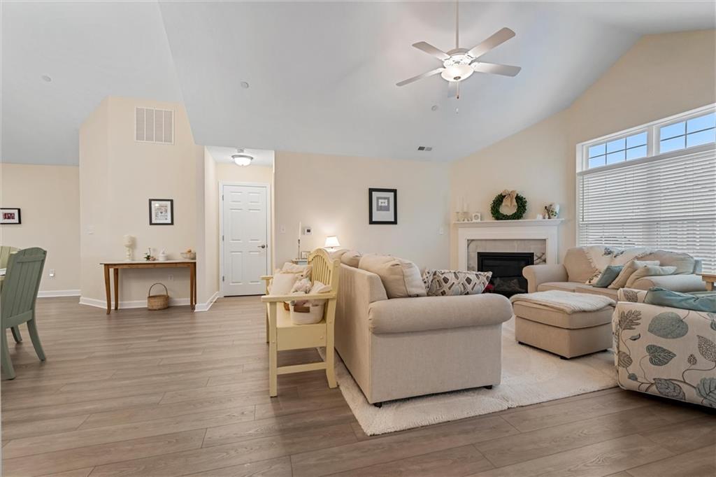 1254 Sandy Rdg Drive Sarver, PA 16055 - Photo 3 of 24 a living room with furniture a fireplace and a ceiling fan