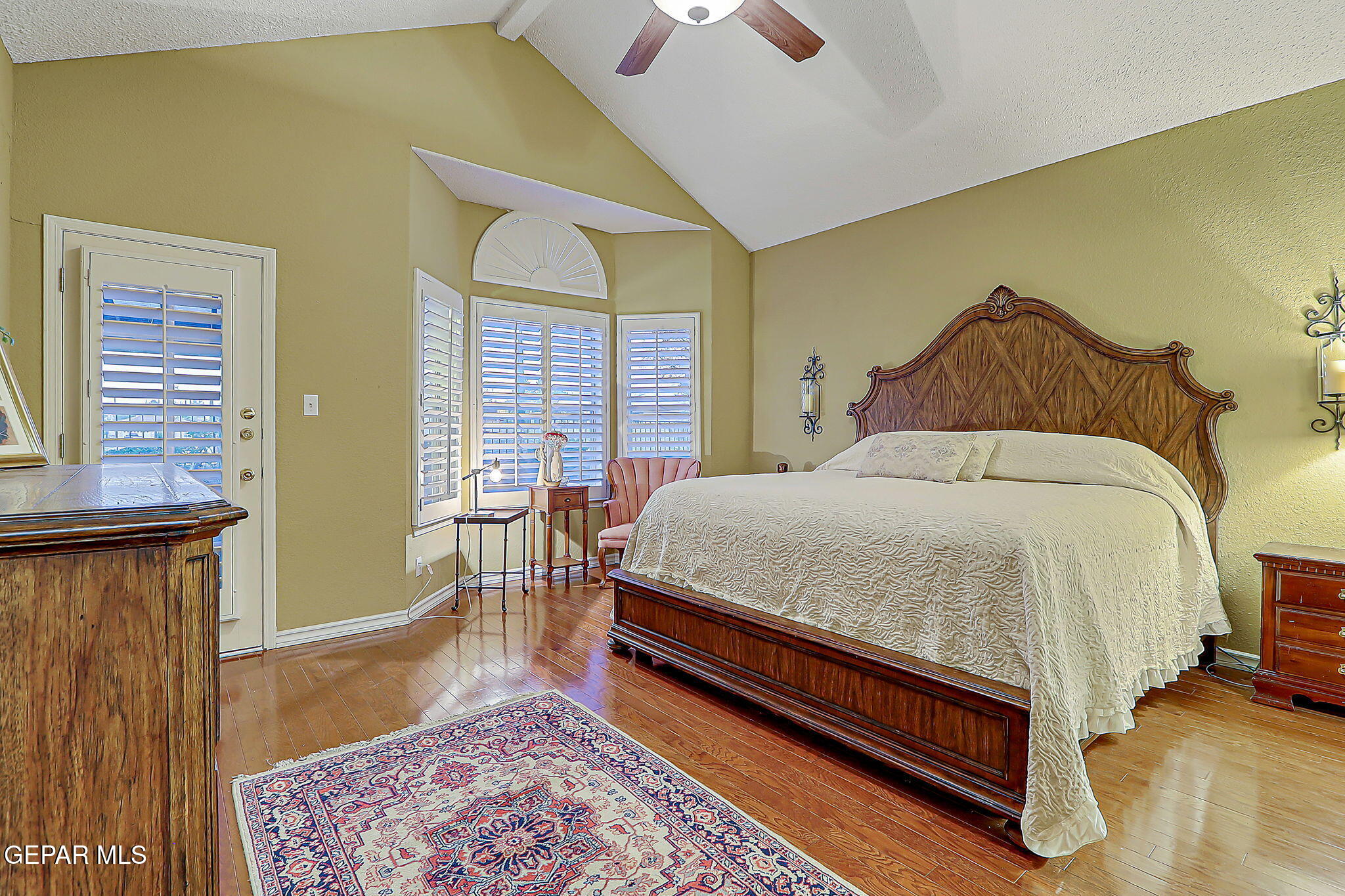 6745 Isla Del Rey Drive El Paso, TX 79912 - Photo 19 of 37 a large bed sitting in a bedroom next to a window