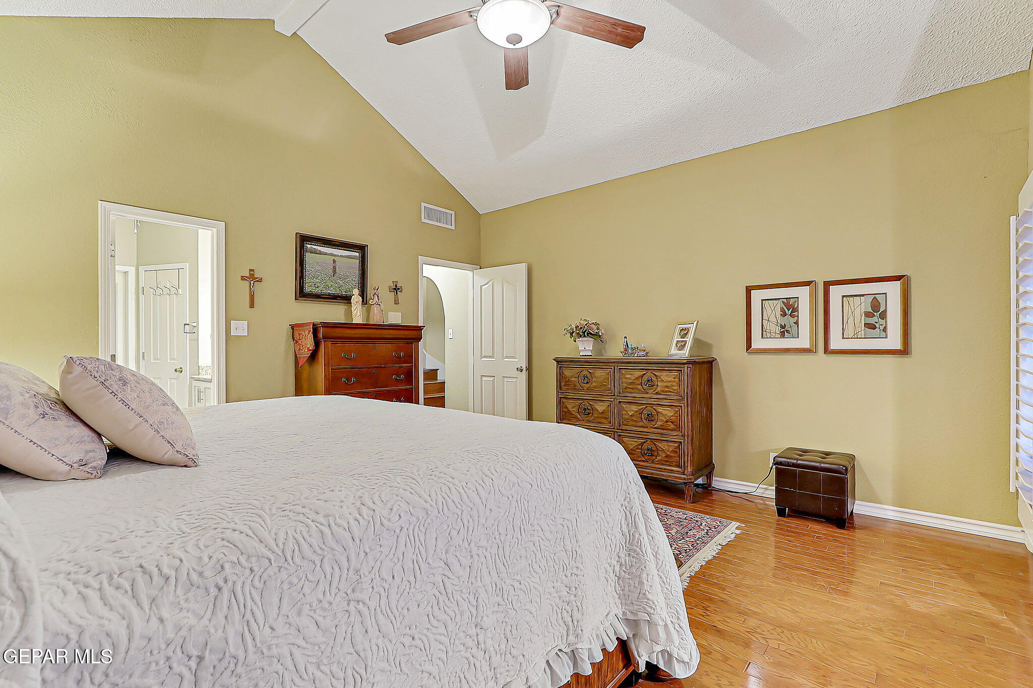 6745 Isla Del Rey Drive El Paso, TX 79912 - Photo 21 of 37 a bedroom with a bed dresser and a flat tv screen