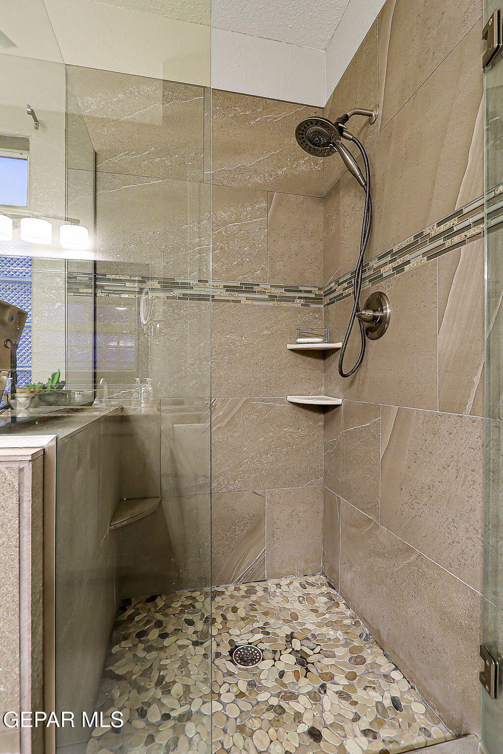 6745 Isla Del Rey Drive El Paso, TX 79912 - Photo 24 of 37 a bathroom with a shower