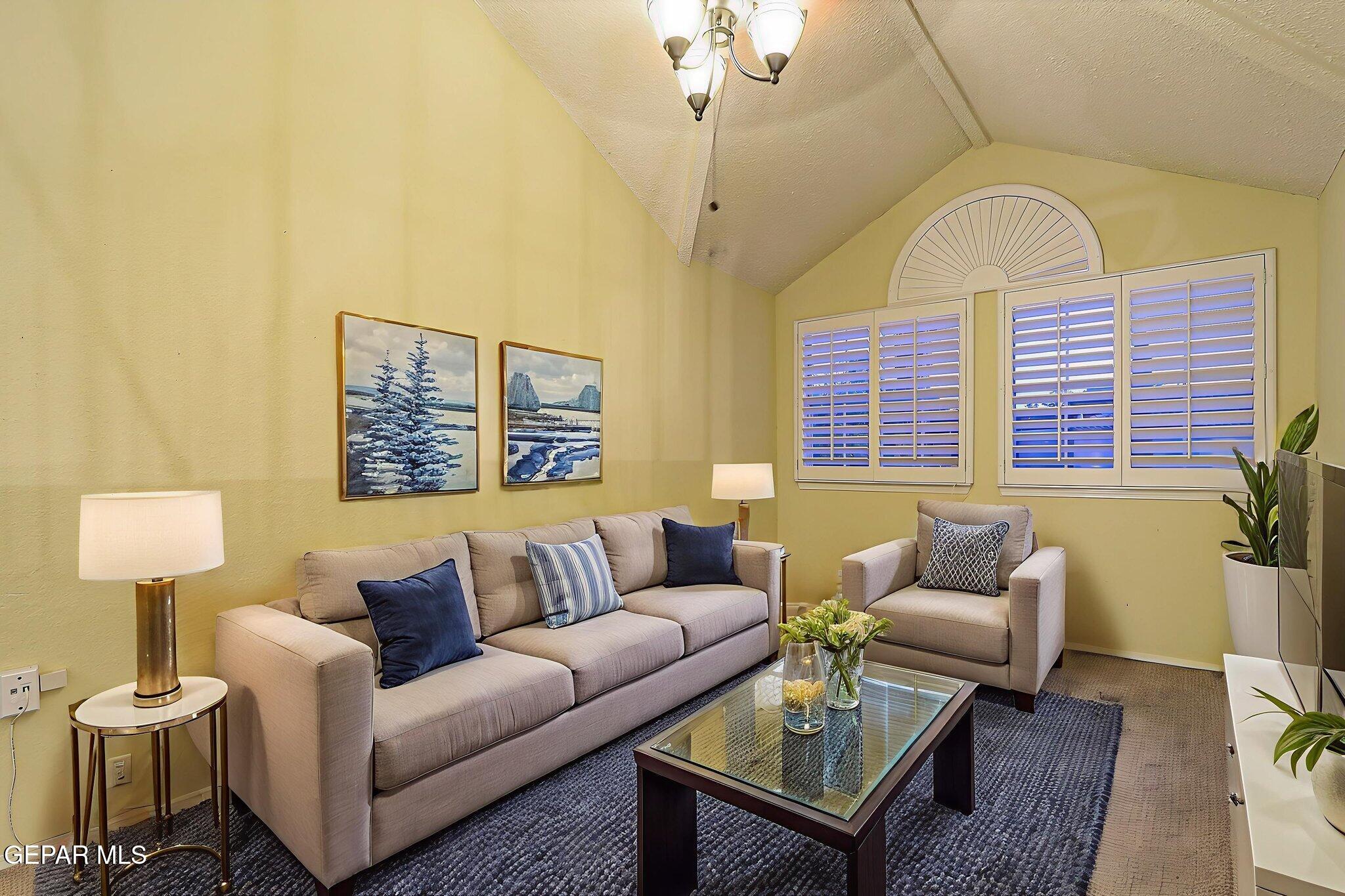 6745 Isla Del Rey Drive El Paso, TX 79912 - Photo 26 of 37 a living room with furniture and a large window