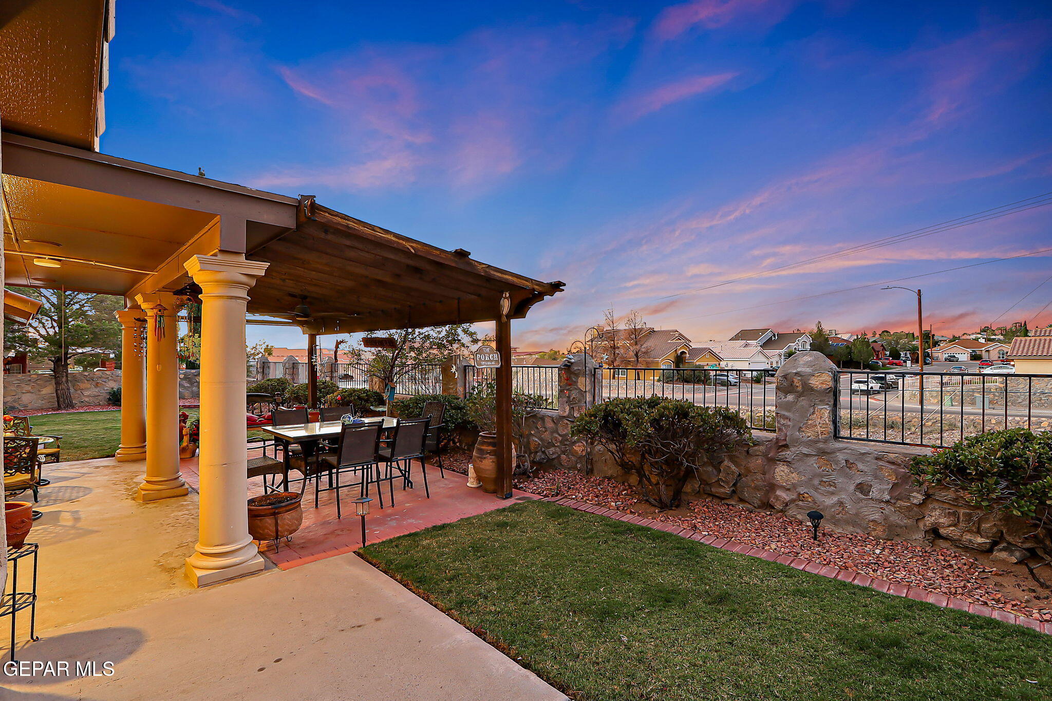 6745 Isla Del Rey Drive El Paso, TX 79912 - Photo 34 of 37 a view of a patio with chairs and potted plants