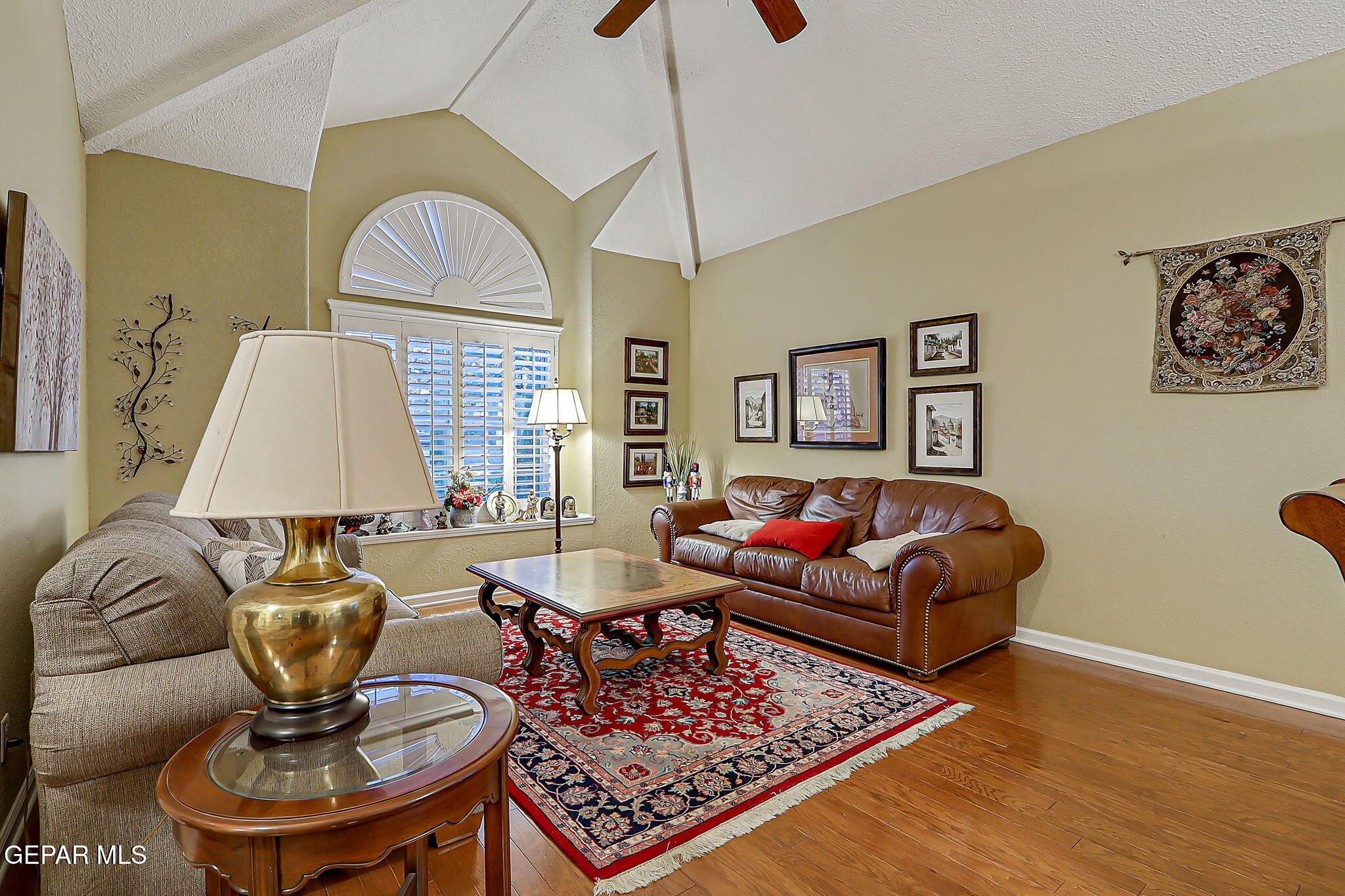 6745 Isla Del Rey Drive El Paso, TX 79912 - Photo 4 of 37 a living room with furniture a window and a lamp