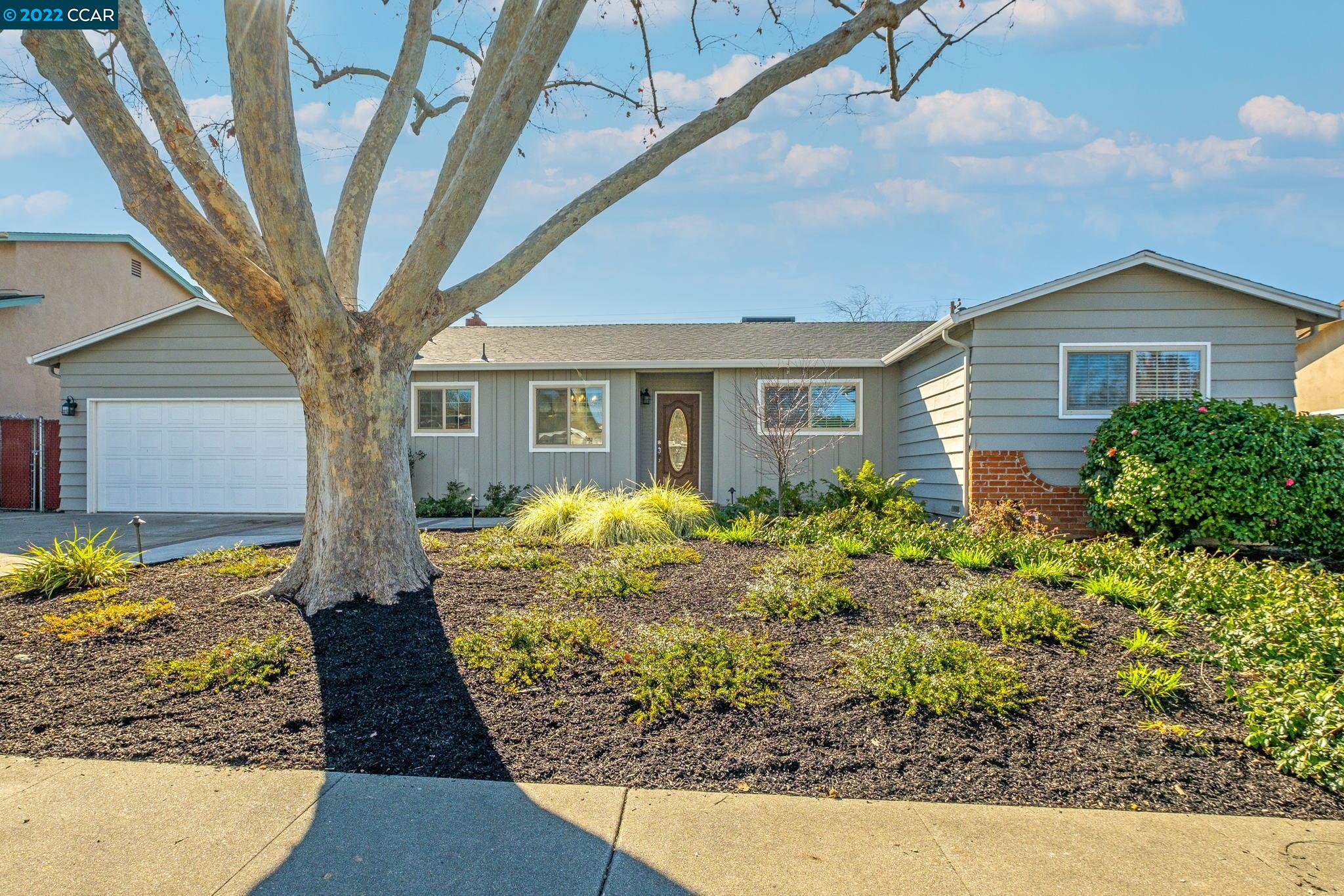 4272 Satinwood Drive Concord, CA 94521 - Photo 1 of 1 a front view of a house with garden