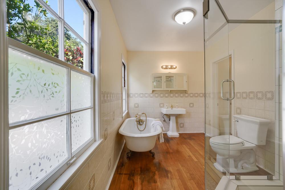 McDaniel Avenue San Jose, CA 95126 - Photo 33 of 54 a spacious bathroom with a granite countertop sink toilet and a shower