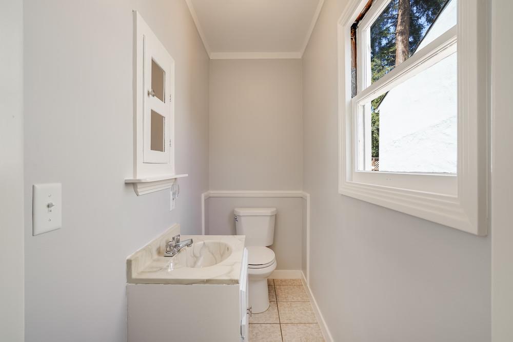 McDaniel Avenue San Jose, CA 95126 - Photo 38 of 54 a bathroom with a sink mirror and toilet