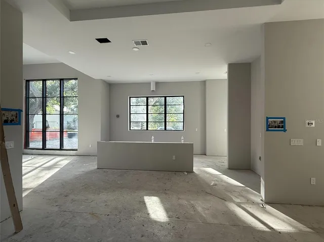 an empty room with windows