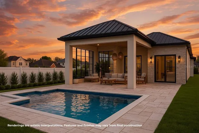 a view of a house with backyard porch and sitting area