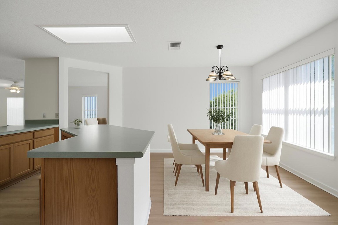 1312 Rosie Lane Cedar Park, TX 78613 - Photo 11 of 38 a view of a dining room with furniture window and outside view