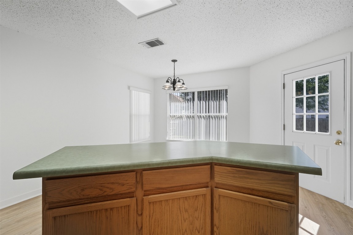 1312 Rosie Lane Cedar Park, TX 78613 - Photo 19 of 38 a kitchen with a sink and cabinets
