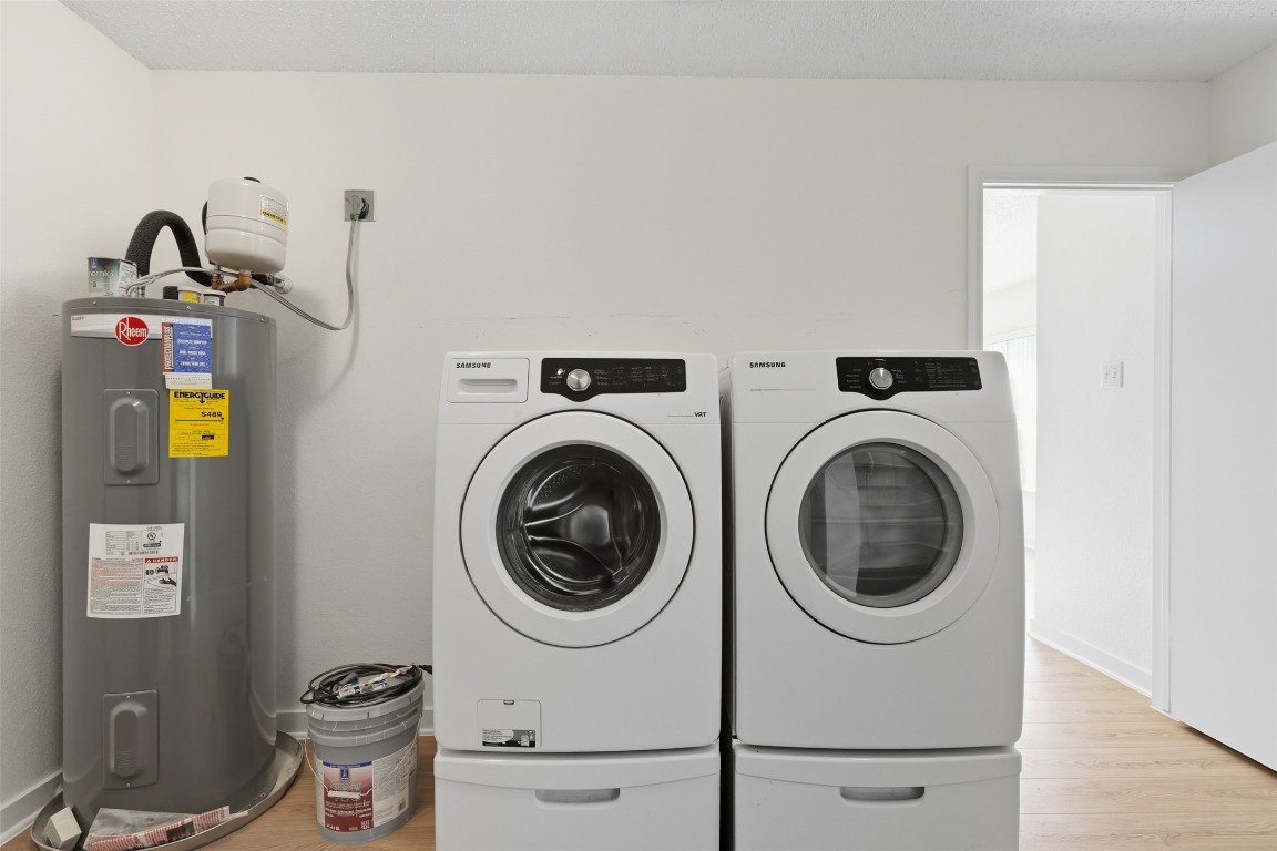 1312 Rosie Lane Cedar Park, TX 78613 - Photo 21 of 38 a utility room with dryer and washer