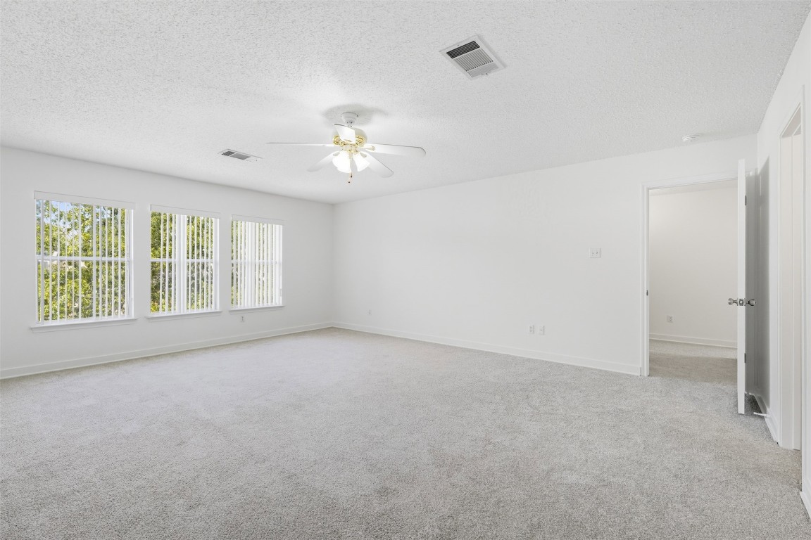1312 Rosie Lane Cedar Park, TX 78613 - Photo 27 of 38 an empty room with a empty space and a window