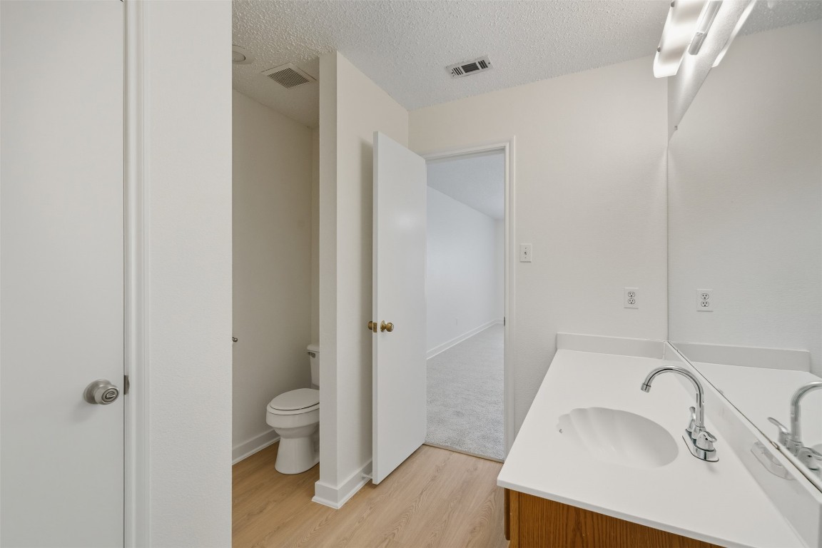 1312 Rosie Lane Cedar Park, TX 78613 - Photo 29 of 38 a bathroom with a sink toilet and shower