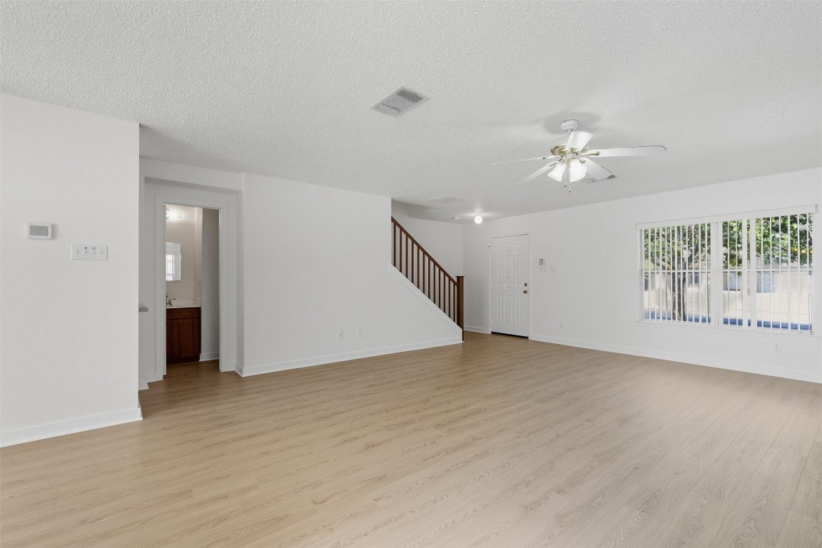1312 Rosie Lane Cedar Park, TX 78613 - Photo 7 of 38 a view of an empty room with a window