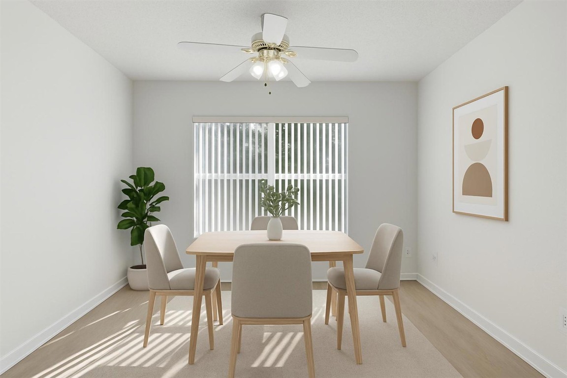 1312 Rosie Lane Cedar Park, TX 78613 - Photo 10 of 38 a view of a dining room with furniture window and wooden floor