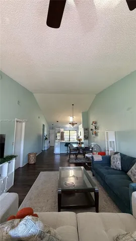 a living room with furniture and a couch