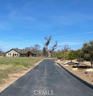 1440 Fire Rock Loop Templeton, CA 93465 - Photo 7 of 14 a view of a street with an ocean view