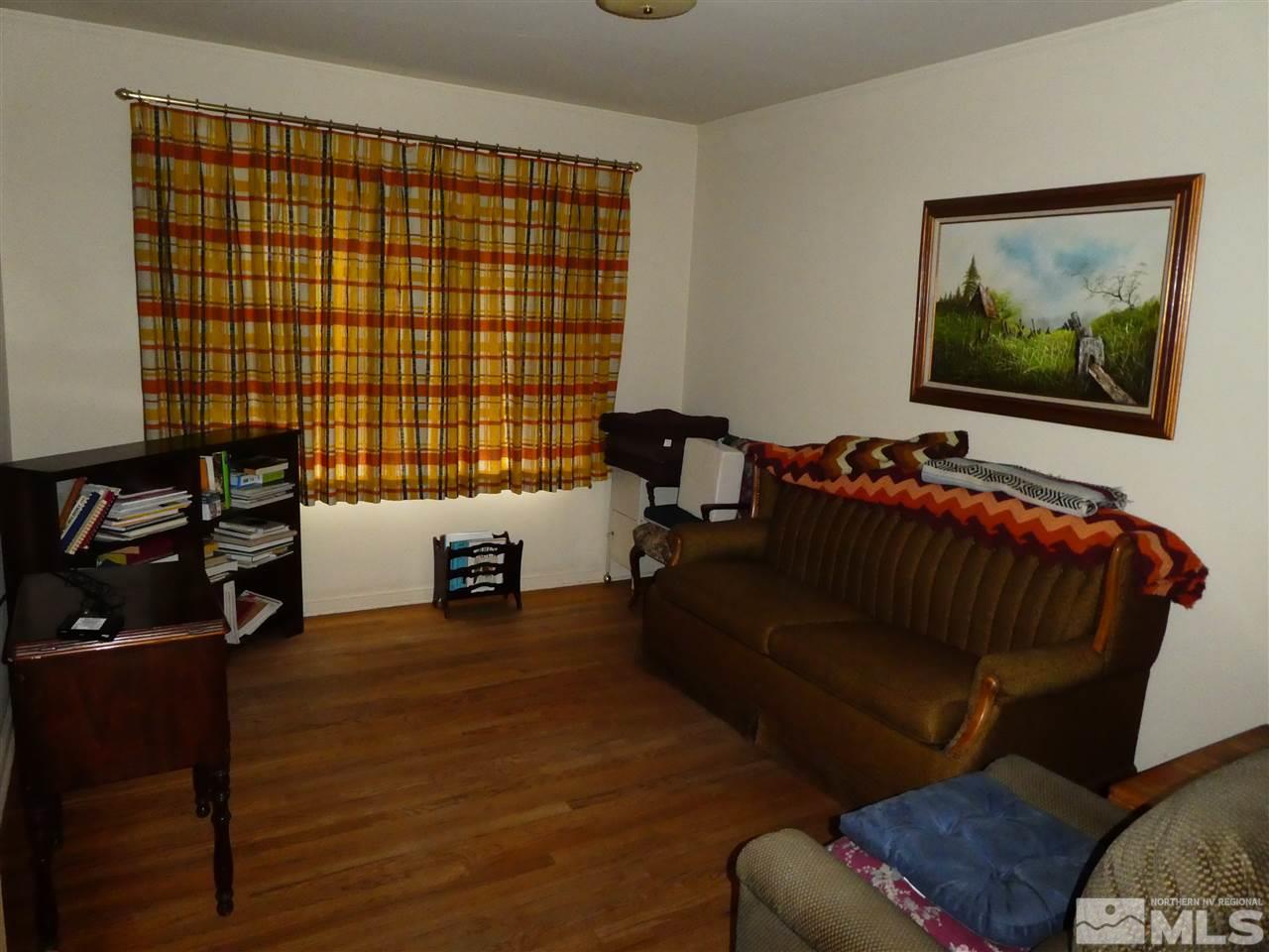908 Gordon Avenue Reno, NV 89509 - Photo 8 of 12 a living room with furniture and a flat screen tv
