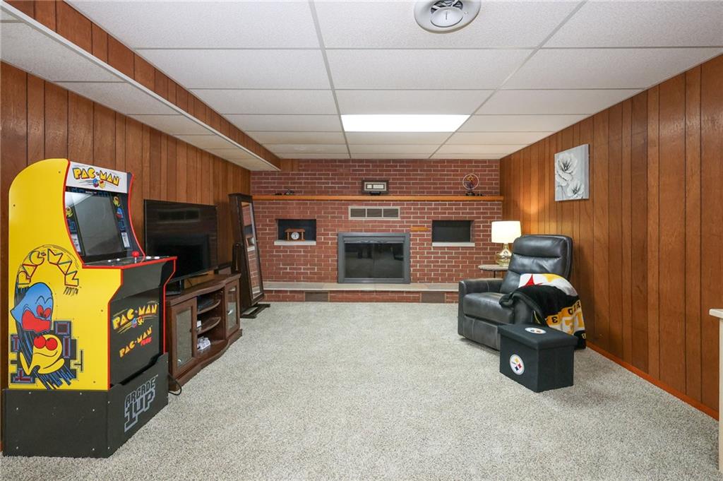 3689 Ridgewood Drive Hermitage, PA 16148 - Photo 28 of 49 a living room with furniture and a flat screen tv