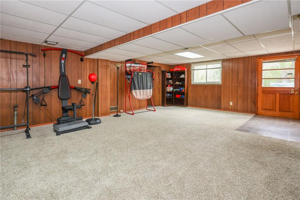 3689 Ridgewood Drive Hermitage, PA 16148 - Photo 29 of 49 an empty room with air conditioner duct and windows