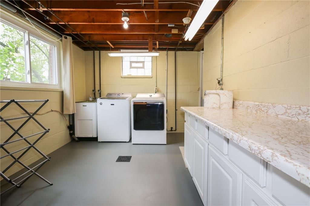 3689 Ridgewood Drive Hermitage, PA 16148 - Photo 30 of 49 a large white kitchen with a large window