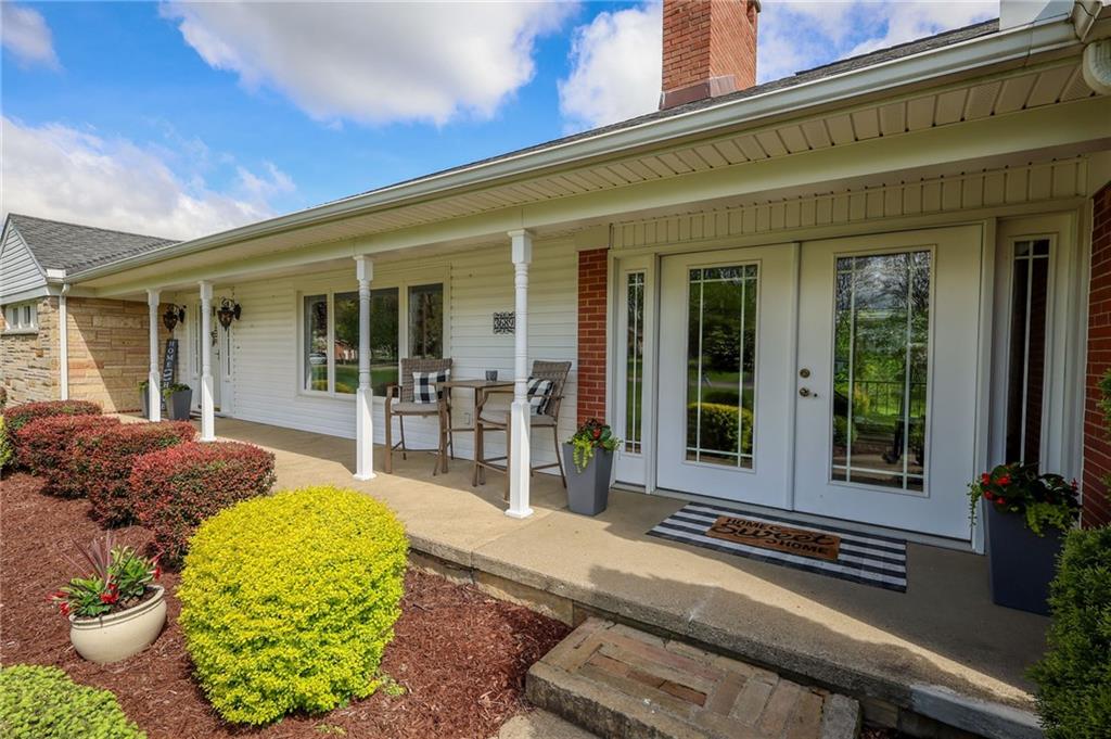 3689 Ridgewood Drive Hermitage, PA 16148 - Photo 3 of 49 front view of a building with a garden