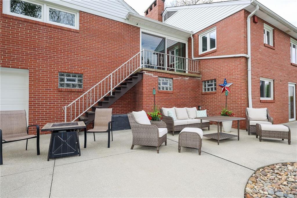 3689 Ridgewood Drive Hermitage, PA 16148 - Photo 39 of 49 a couple of chairs sitting in front of building